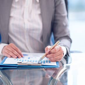 woman looking at document determining modified requirments for fsvp